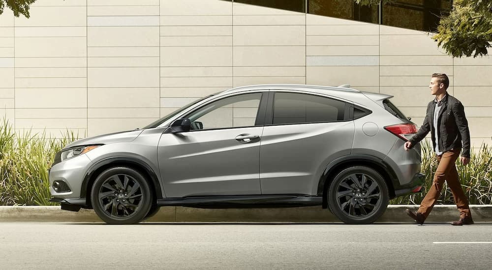 A silver 2022 Honda HR-V is shown from the side after leaving a Honda dealer in Western TX.